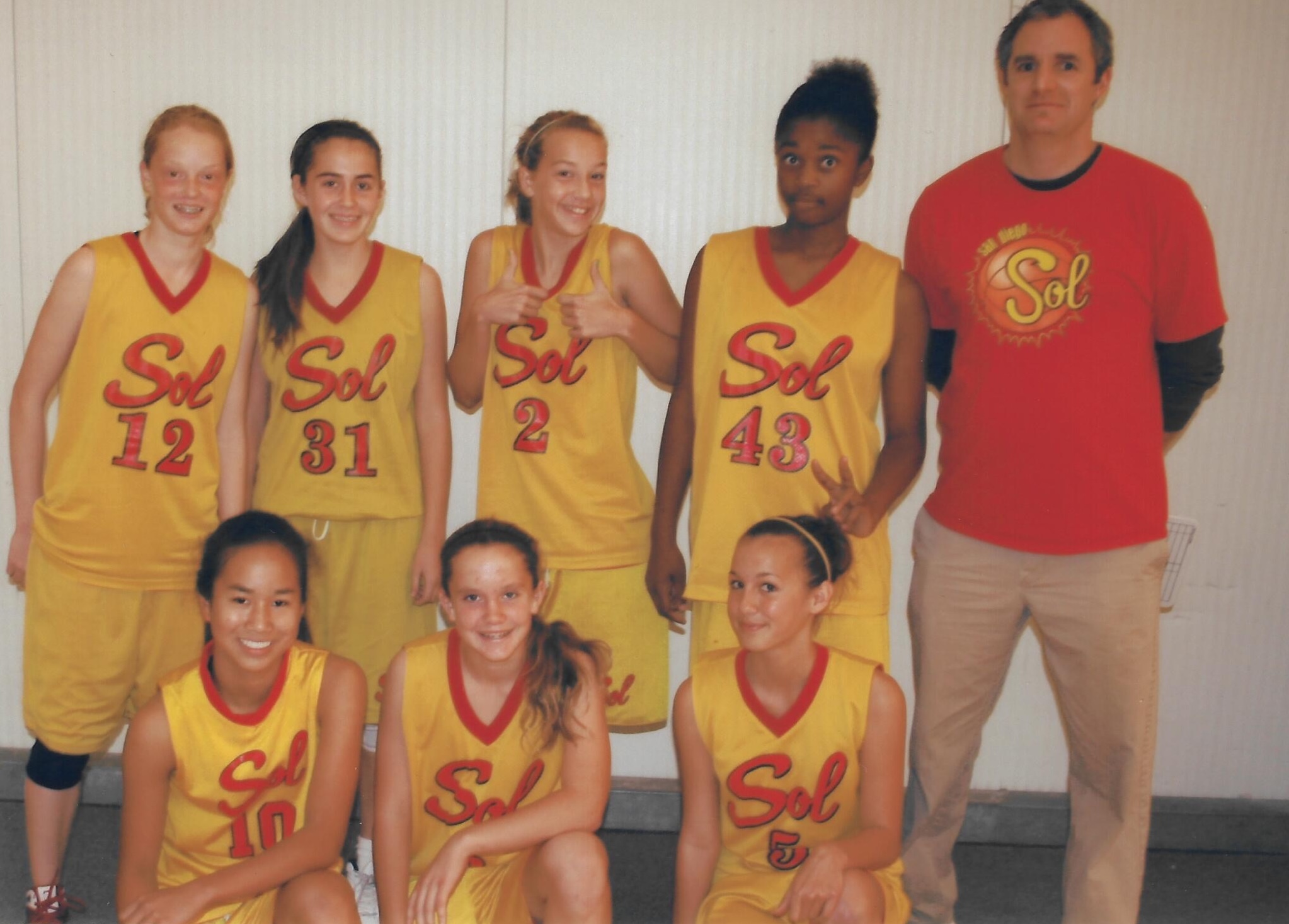 Coach Nate with 8th Grade Sol girls basketball team